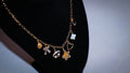 Checker Flower Charmed Necklace