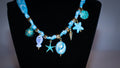 Blue Shell Charmed Scarf Necklace
